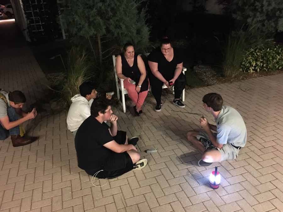 Evan demonstrating devices used to detect foreign energy 